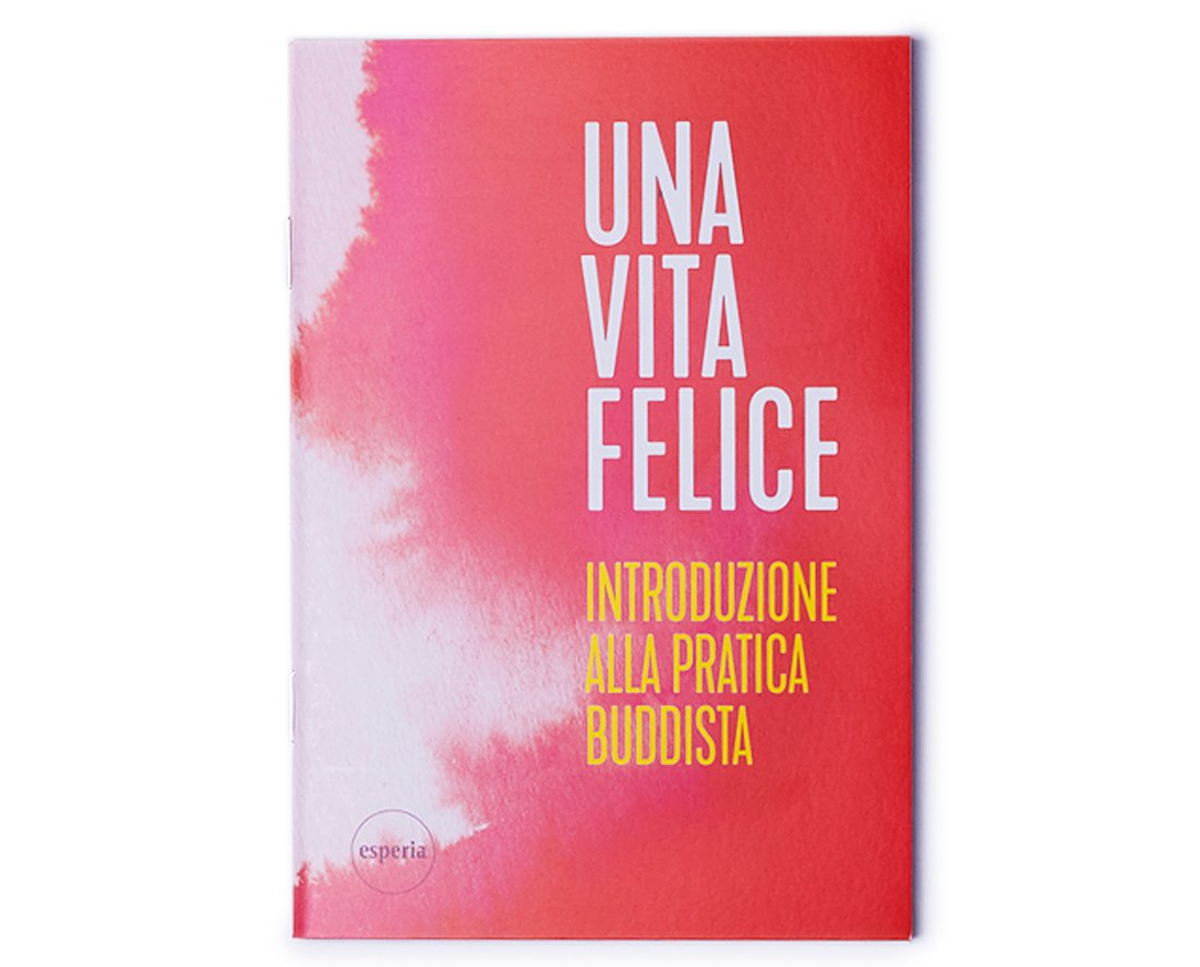 Un libro rosso e bianco intitolato una vita felice
