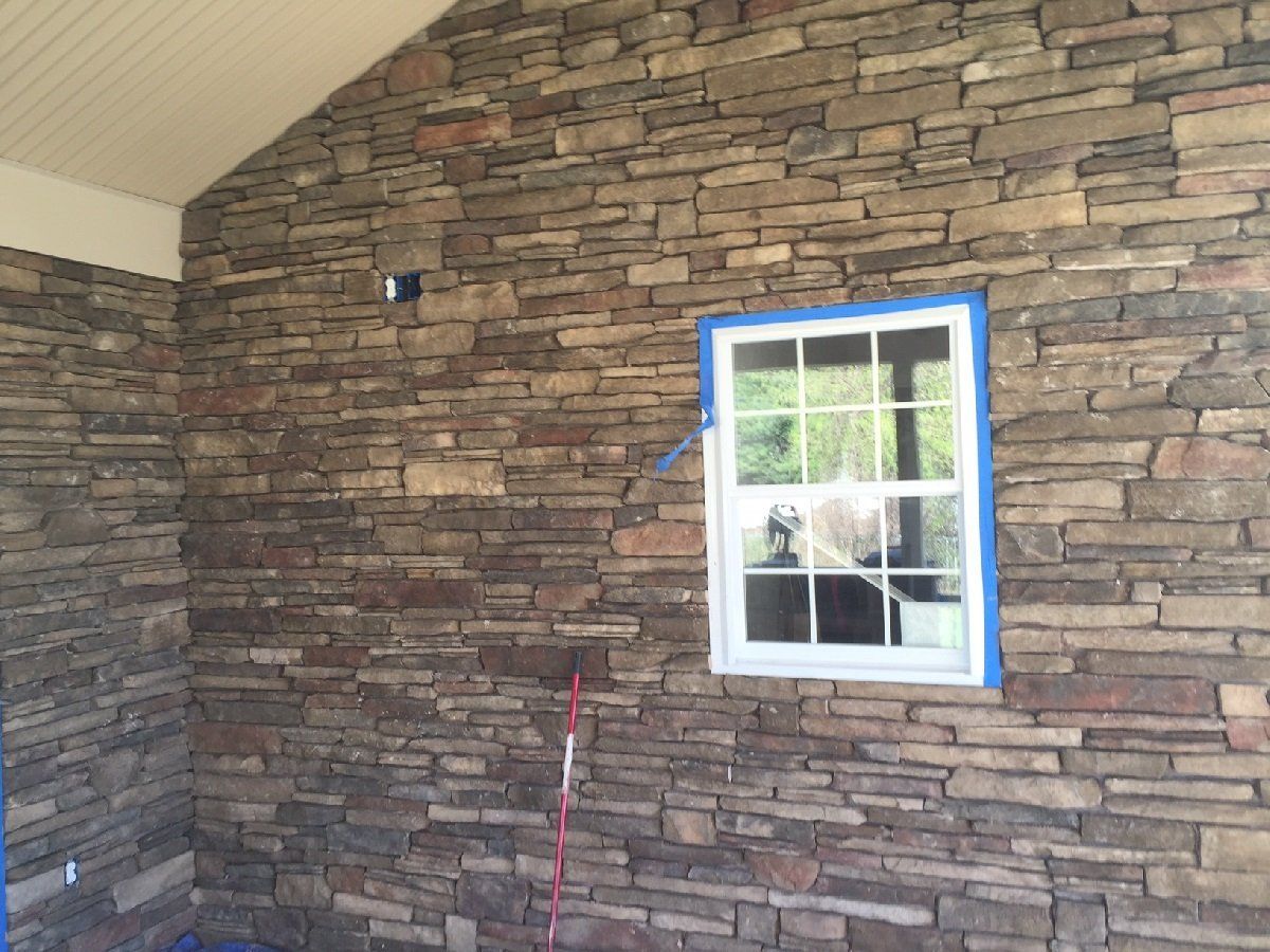 Brick House withe Glass Window — Cinnaminson, NJ — A & M Masonry and Concrete