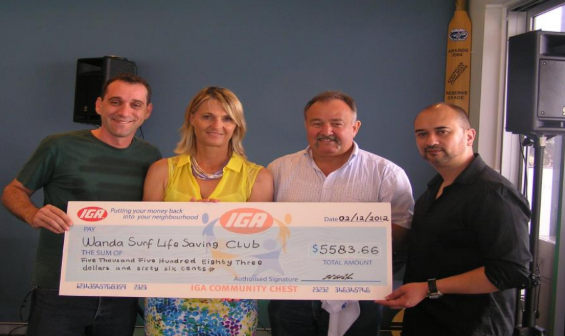 IGA Beneficiaries with the check