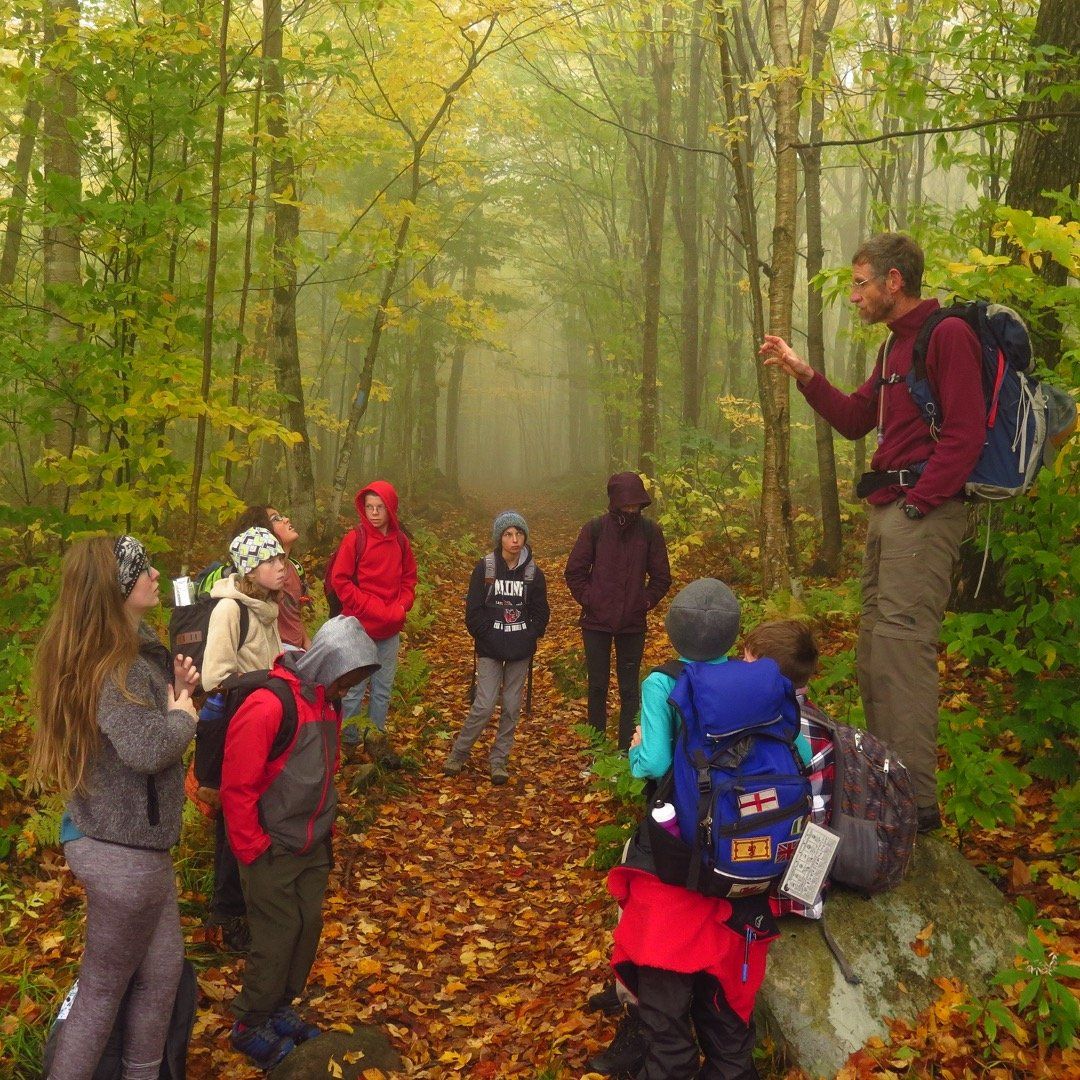 teacher teaching students about science and nature