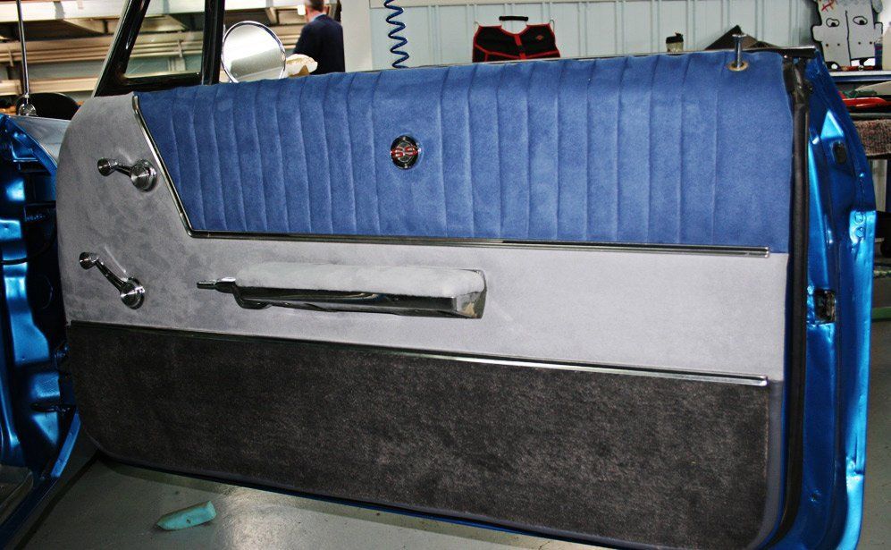 blue,black and white car door handle