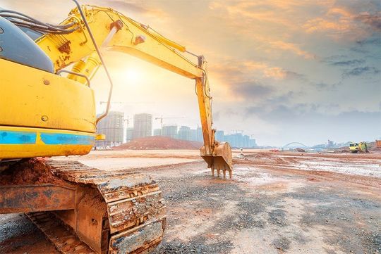 excavator at dusk