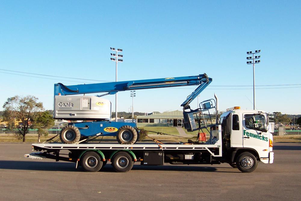 large machinery being towed