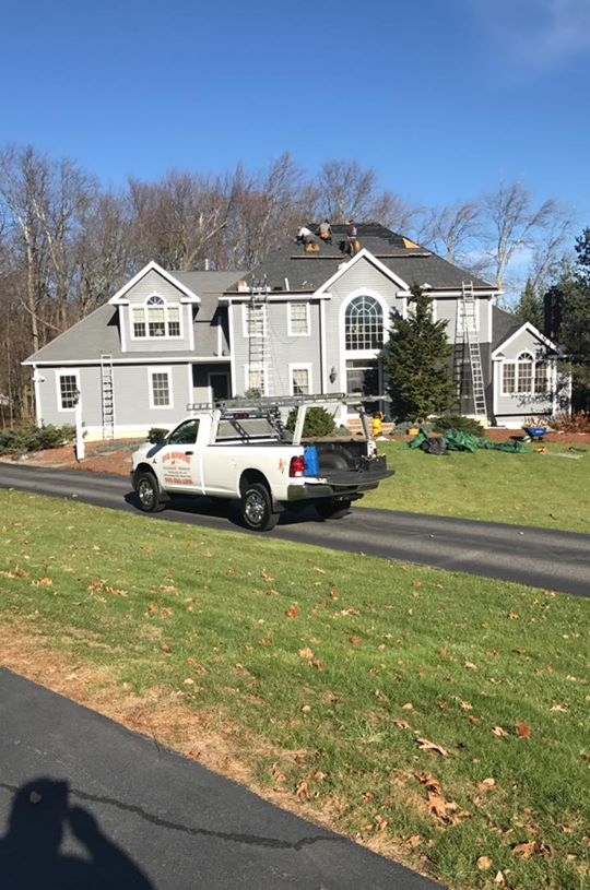Leak Repair — Team Repairing Customers Roof in West Boylston, MA Leak Repair — Team Repairing Customers Roof in West Boylston, MA