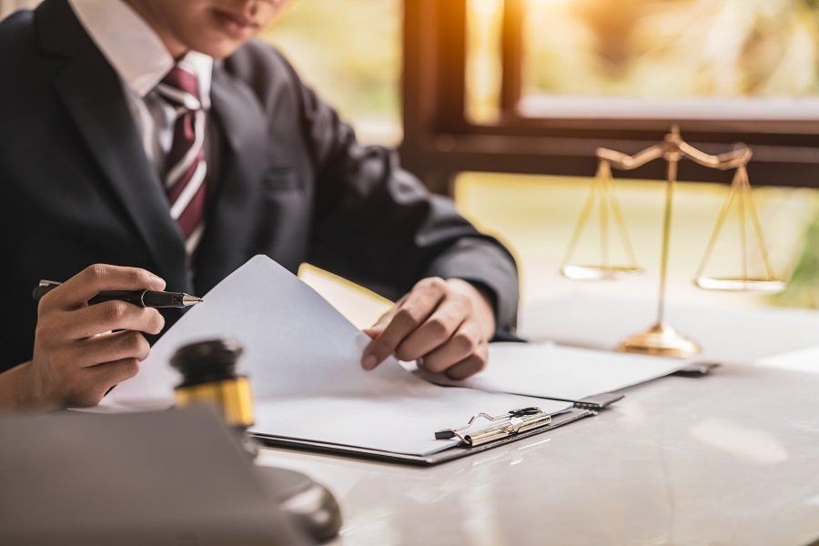 a professional attorney going over his legal notes