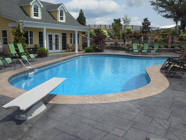 Pool With Diving Board And Chairs On The Side — Staunton, VA — Valley Pool & Spa