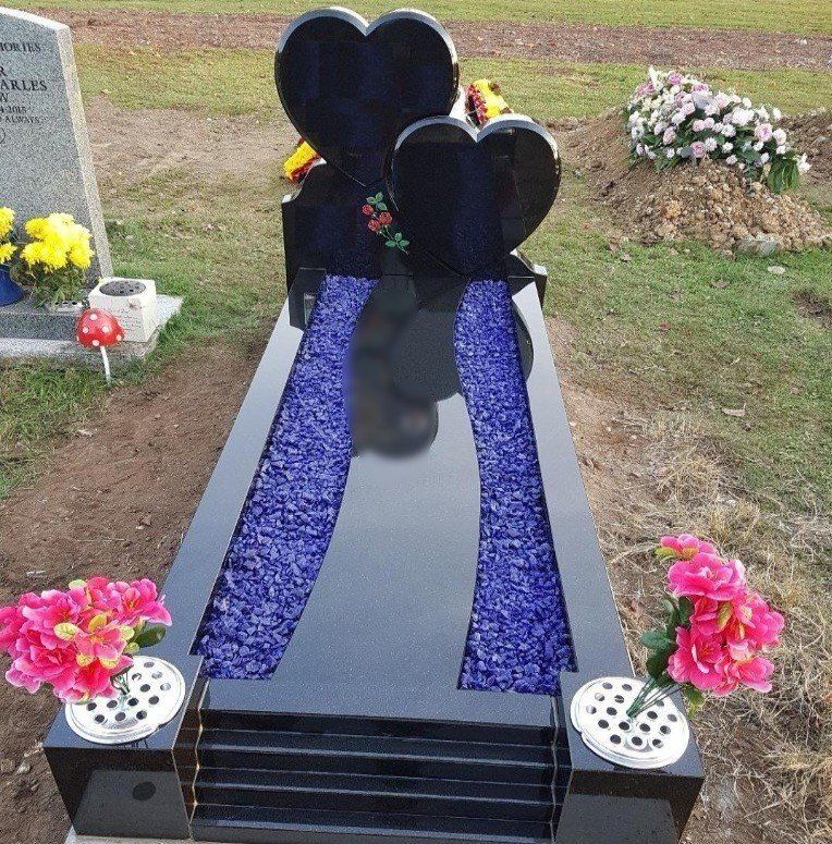 heart shaped memorial on grave
