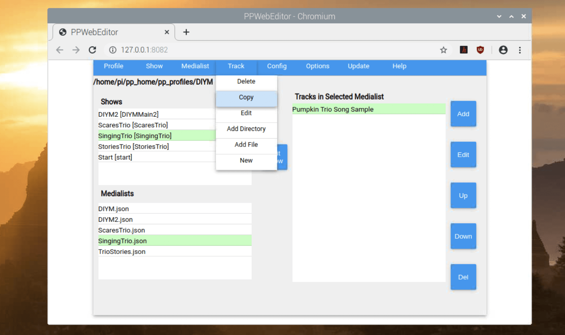 A web-based interface for managing patient medication, featuring a drop-down menu over a list of medications and tests.