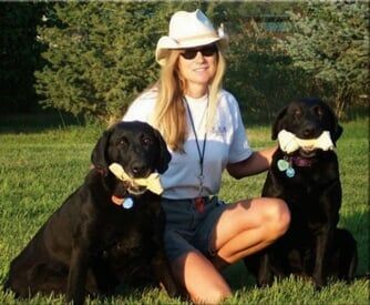Woman with Two Dogs — Bozeman, MT — Bozeman Independent Agency, Inc. Woman with Two Dogs — Bozeman, MT — Bozeman Independent Agency, Inc.