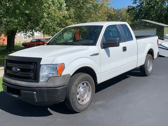 2014 Ford White Car — Niagara Falls, NY — Halleen's Automotive and Accessory Store