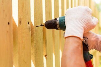 Carpenter Repairing Fences — Office Improvement in Hampton, VA Carpenter Repairing Fences — Office Improvement in Hampton, VA