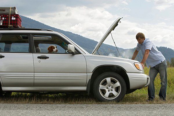 man with broken down car A vehicle in need of our automatic transmission services in Perth