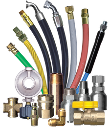 Assorted hoses, fittings, and connectors in various colors, sizes, and materials for industrial or plumbing use.