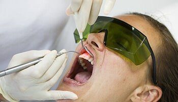 Dentist Using a Modern Diode Dental Laser Dentist Using a Modern Diode Dental Laser