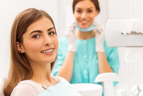 Woman with Clear Braces — Orthodontist in Hemet, CA Woman with Clear Braces — Orthodontist in Hemet, CA