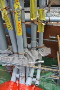 Isaiah Jiminez of Mr. T's Pest Control installs Termimesh to cluster of pens at this Wailupe Circle future residential home being built by Armstrong Builders.