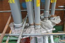 Isaiah Jiminez of Mr. T's Pest Control installs Termimesh to cluster of pens at this Wailupe Circle future residential home being built by Armstrong Builders.