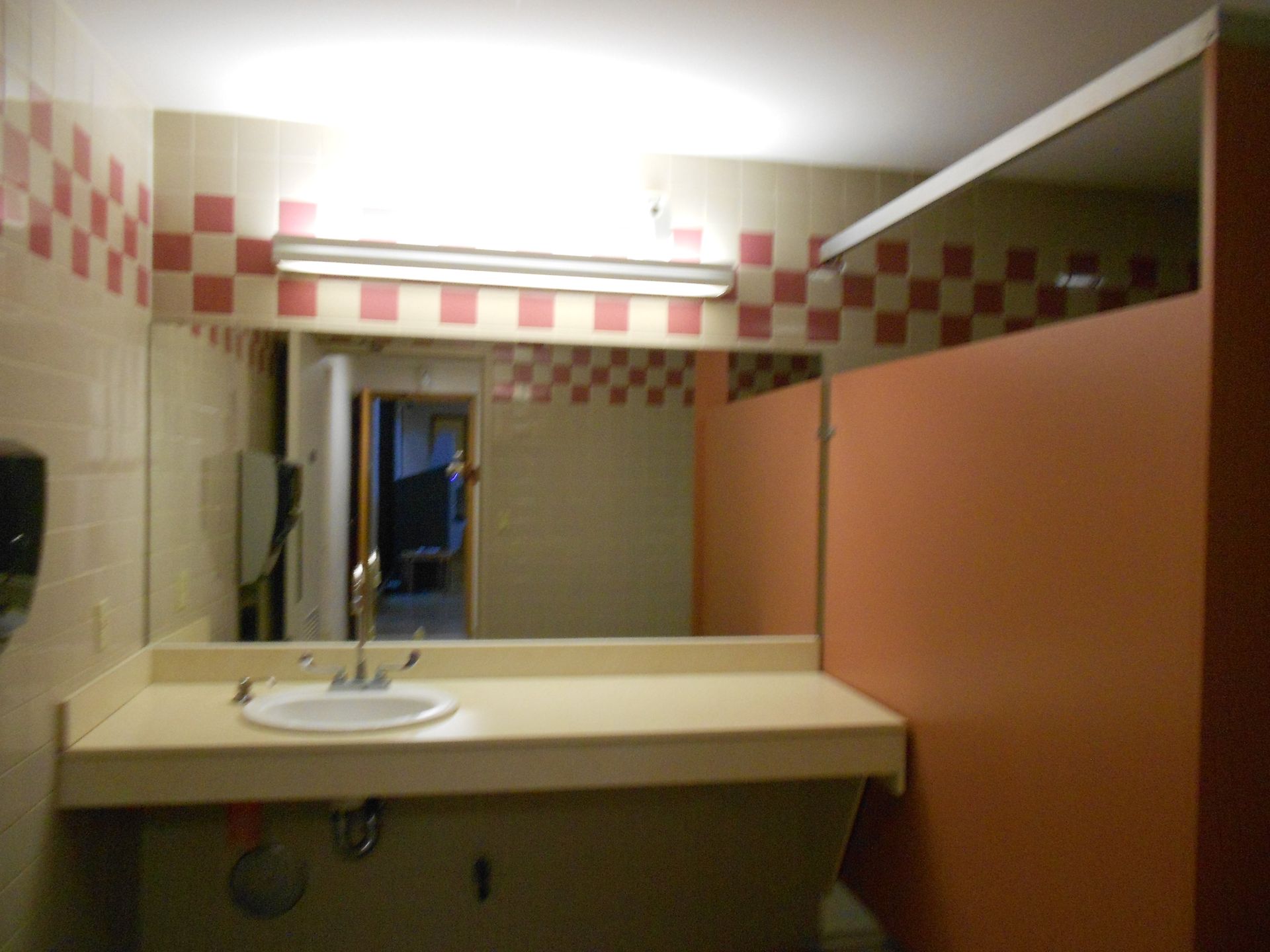 Janitorial service in a bathroom, Kihei