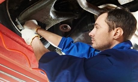 expert fixing truck