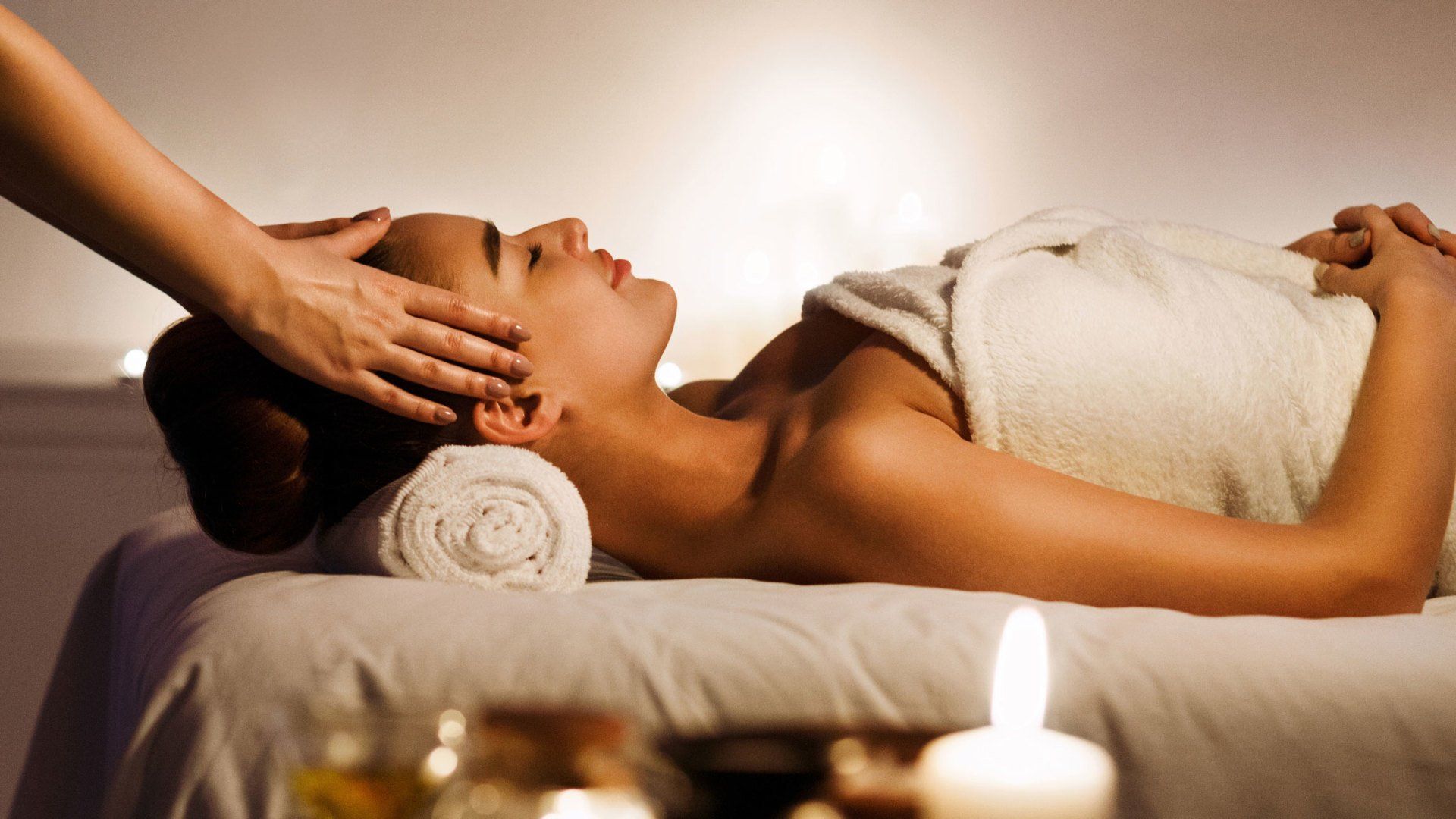 Stress Relief — Woman Enjoying Face Massage in West Springfield, MA Stress Relief — Woman Enjoying Face Massage in West Springfield, MA