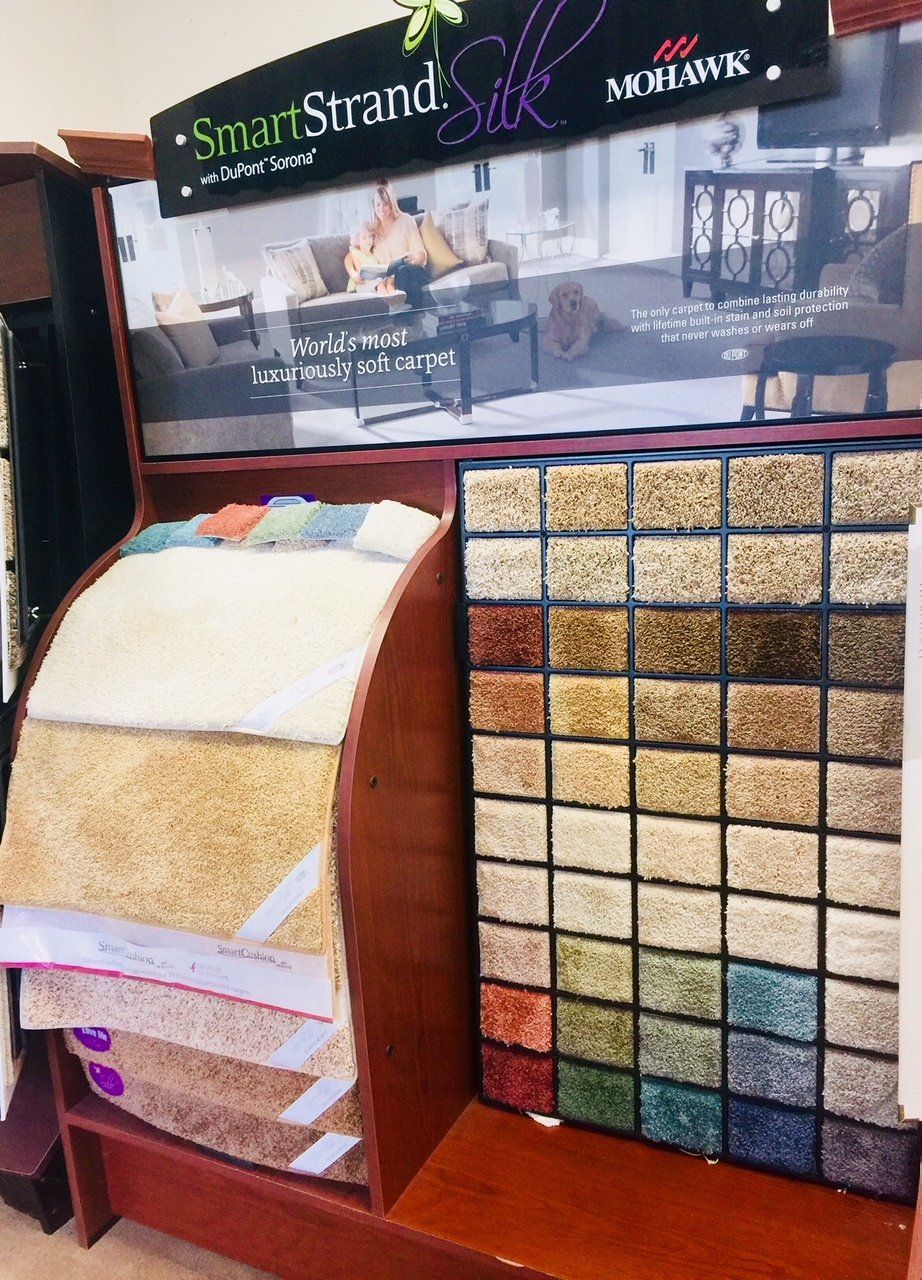 Flooring Retail — Carpet Rolls In Assorted Colors in Fort Pierce, FL Flooring Retail — Carpet Rolls In Assorted Colors in Fort Pierce, FL