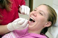 Dental Care — Checking Patient in Newington, CT Dental Care — Checking Patient in Newington, CT