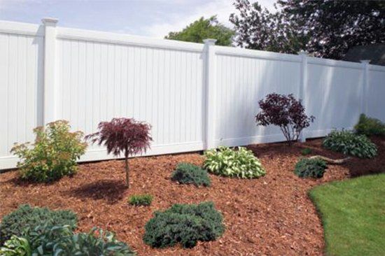 Vinyl Fencing - White Vinyl Fence in a Backyard in Oklahoma City, OK