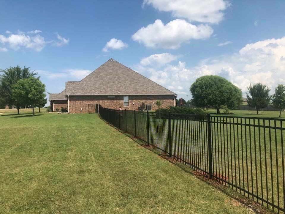 HOA Fence - Black Wrought Iron Fence in a Neighborhood in Oklahoma City, OK