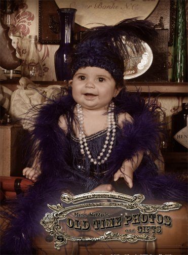 a baby is dressed in a purple flapper dress - Miss Old Time Photos and Gifts Corolla Outer Banks NC