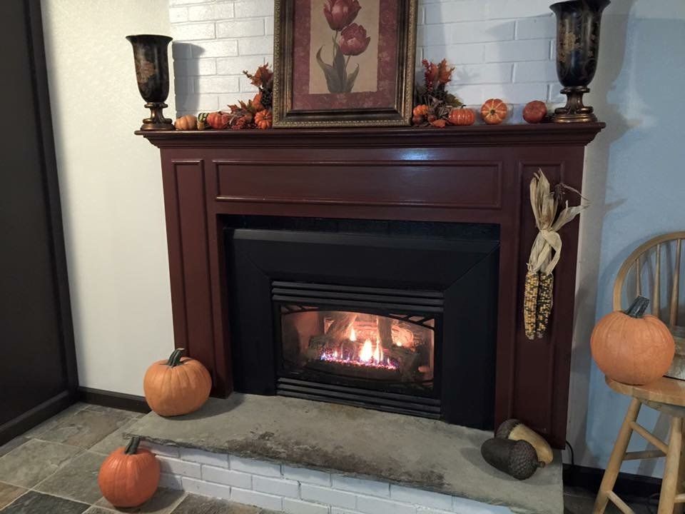 Fireplace decorated for halloween / fall in rm 1