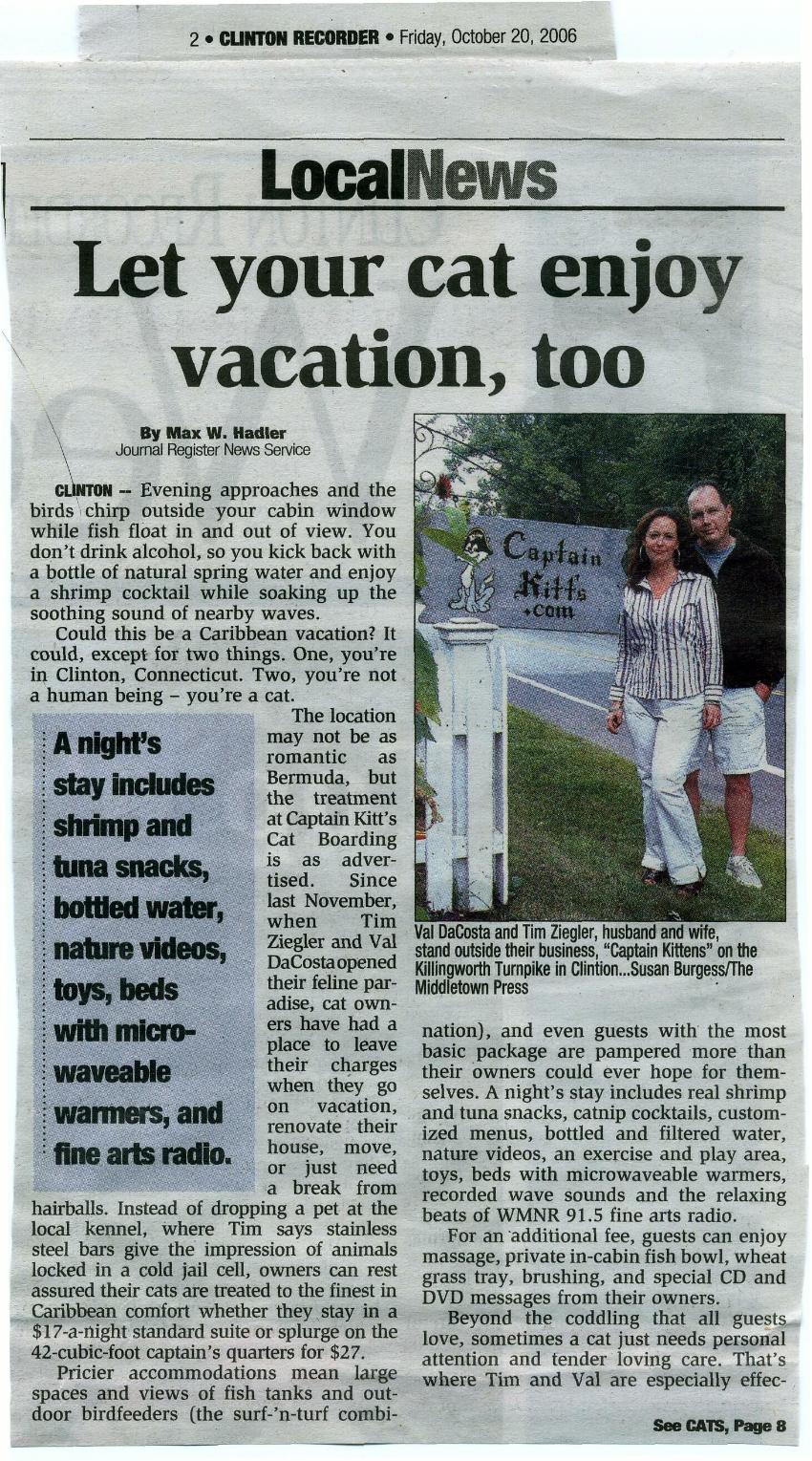 photo of Val & Tim / owners from a New Haven Register article featuring our upscale cat hotel