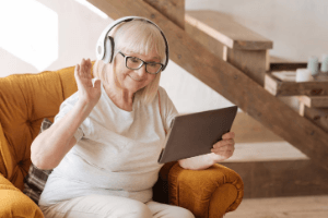 Senior Woman Holding Tablet — Philadelphia, PA — Advance Physical Therapy