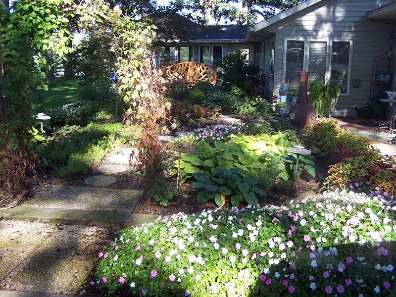 A House With No Maintenance Lawn — Coal Valley, IL — Kymbyl Komplete Kare , INC.