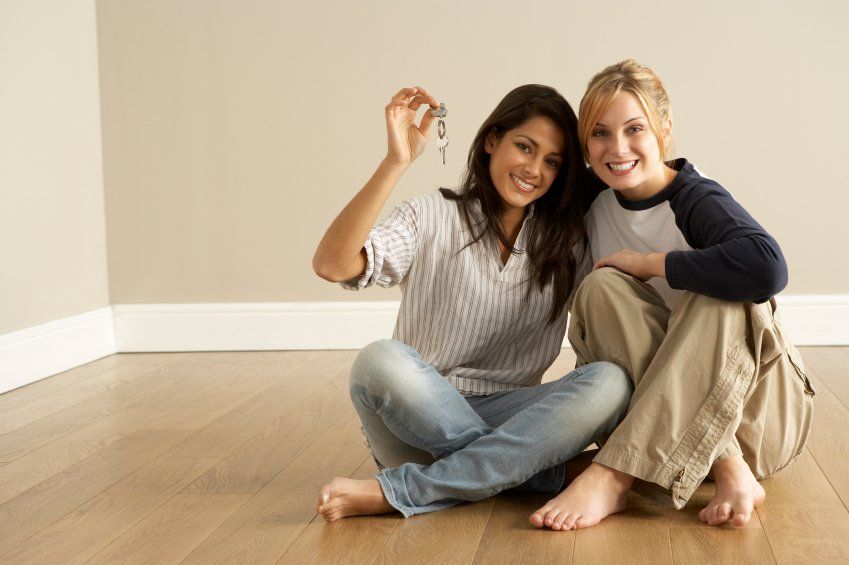 Female Friends Moving Into New Home