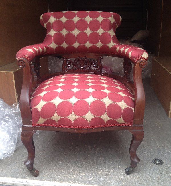georgian armchair upholstered in modern pink and white fabric