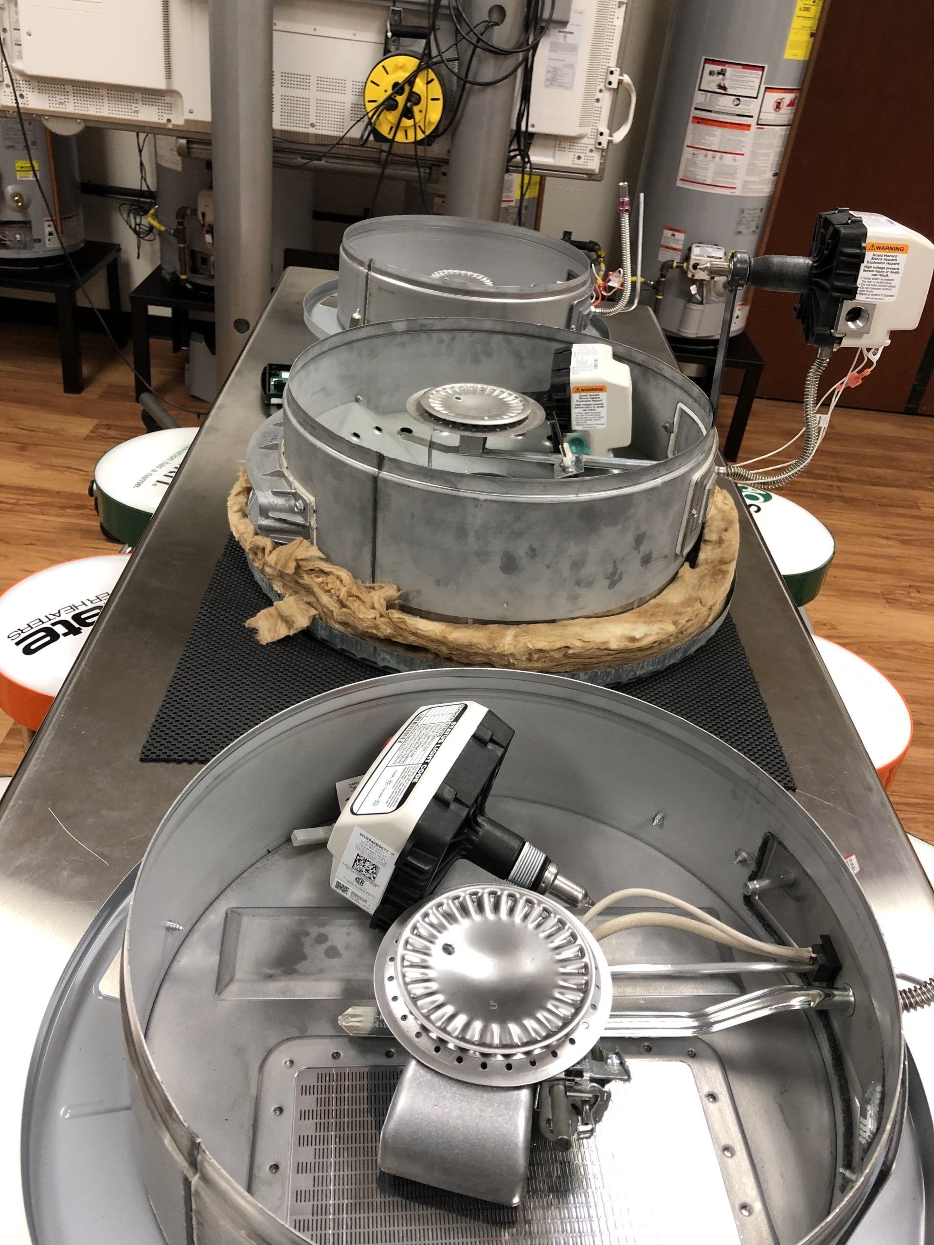 A.O. Smith University - Working on residential burner assemblies