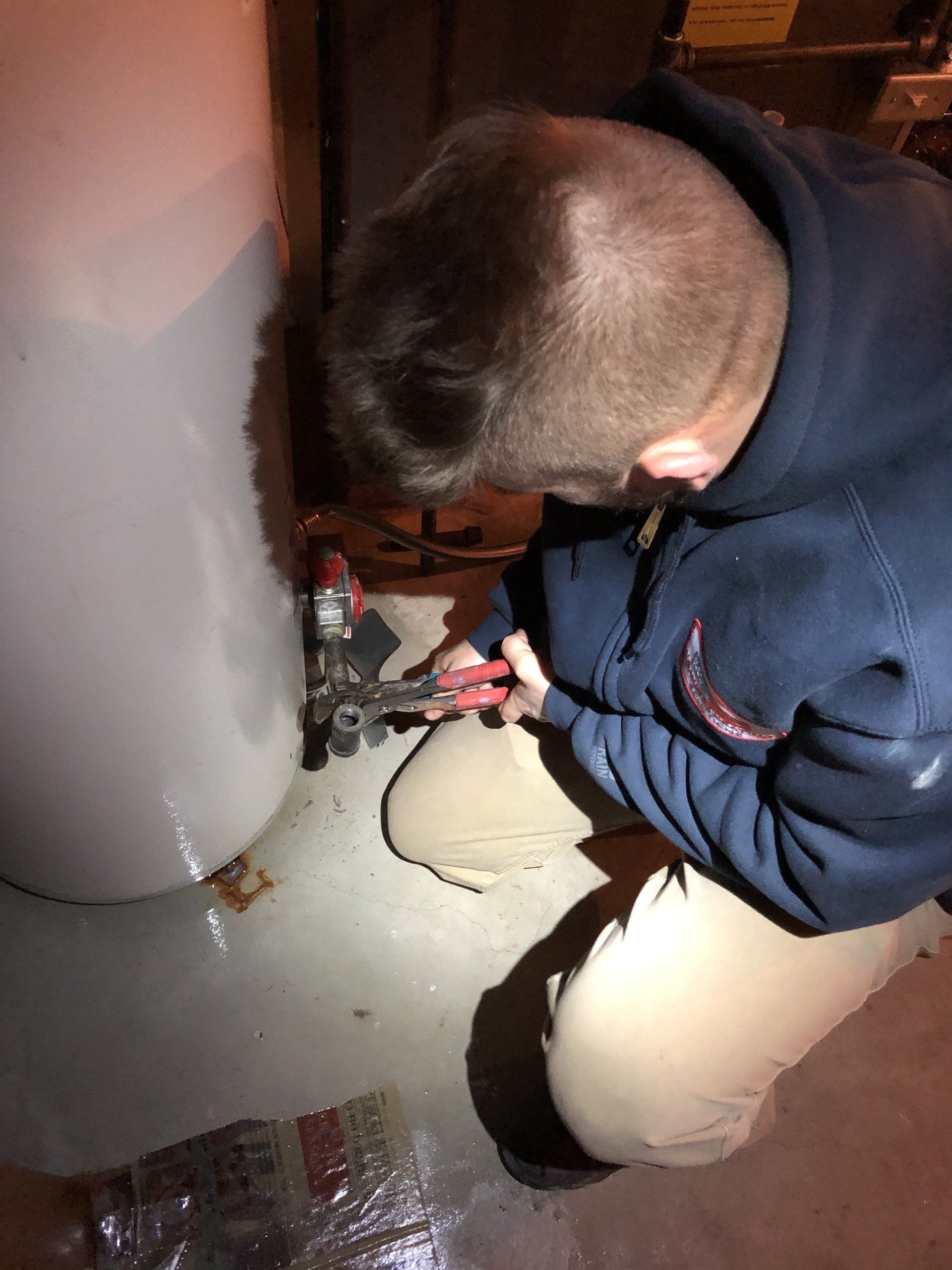 slideshow of water heater repair at airport