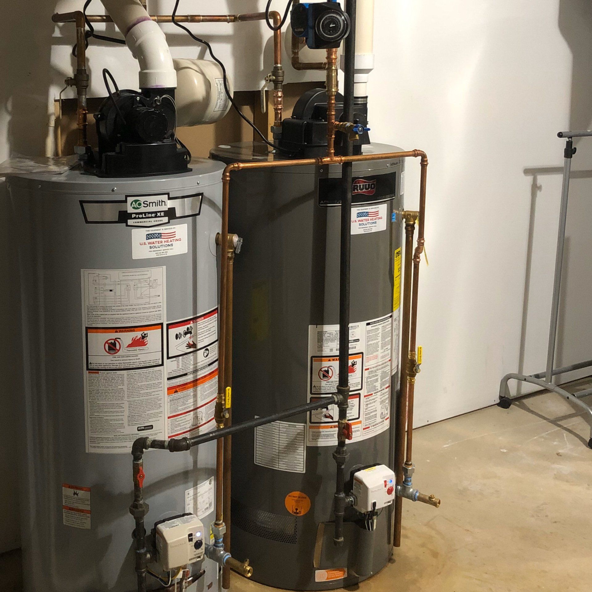 Instalación de calentador de agua Power Vent de 75 galones