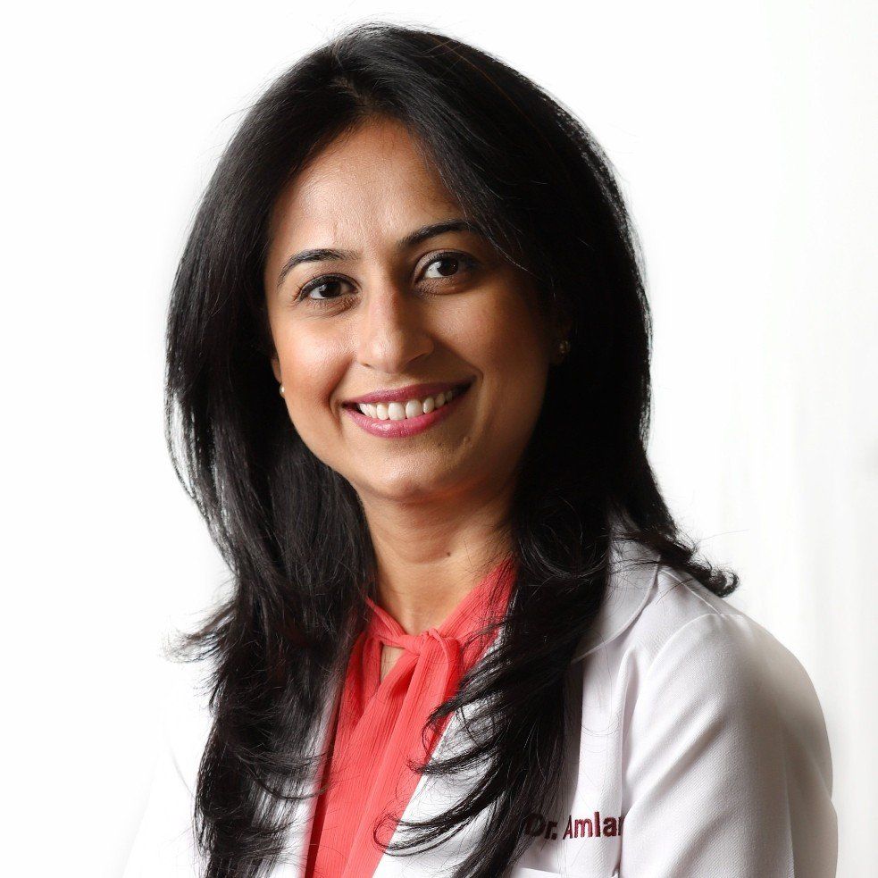 Dr Amlani