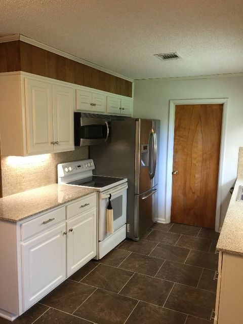 kitchen with white top drawer