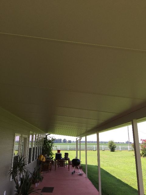 PATIO COVER 8' X 62' ACROSS BACK OF HOUSE, 3 INCH INSULATED ROOF, McGEHEE, AR. PATIO COVER 8' X 62' ACROSS BACK OF HOUSE, 3 INCH INSULATED ROOF, McGEHEE, AR.