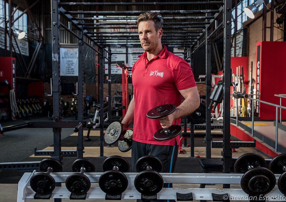 man with dumbbells