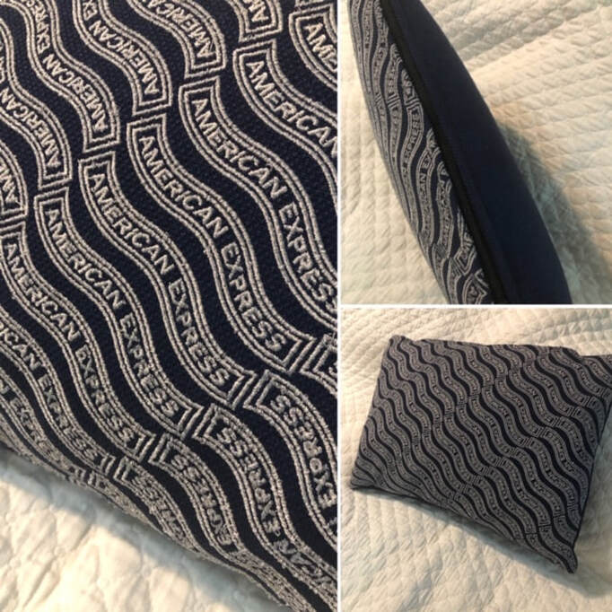 A pillow with american express written on it