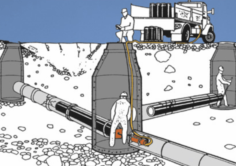 A black and white drawing of a man standing in a hole surrounded by pipes
