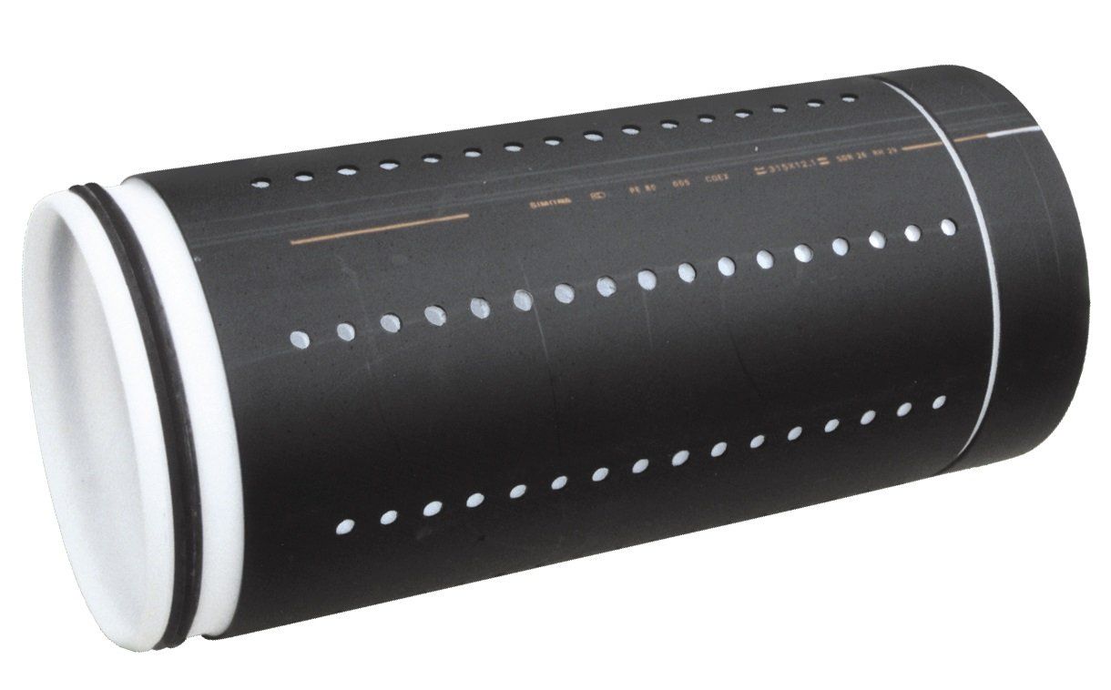 A black cylinder with white dots on it