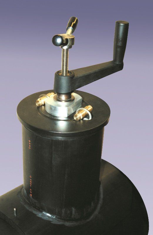 A black object with a handle on top of it