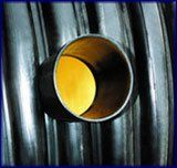 A close up of a metal pipe with a hole in it.
