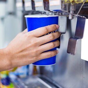 Ice Machines — Man Using an Ice Machine in Tulare, CA Ice Machines — Man Using an Ice Machine in Tulare, CA