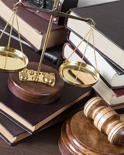 Symbols of Law — Hanover, PA — Strausbaugh Law PLLC Symbols of Law — Hanover, PA — Strausbaugh Law PLLC