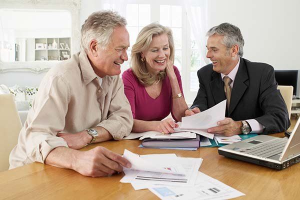 Couple with Financial Advisor — Tax Planning in Sterling, CO Couple with Financial Advisor — Tax Planning in Sterling, CO